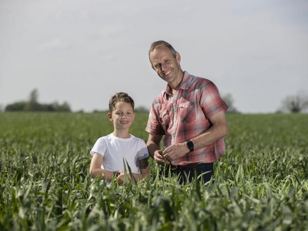 Farmer in Oats field